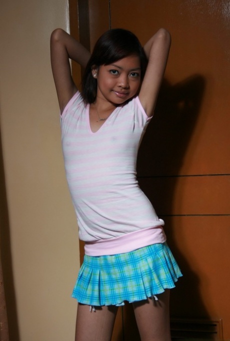 Tiny Asian girl shows off her flat chest and tight beaver for first time