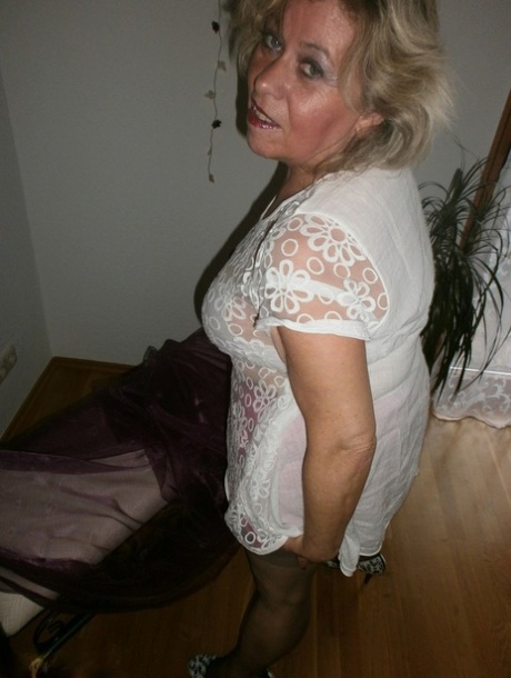 Kinky amateur mature woman Caro reveals and pleases her wolf hairy twat