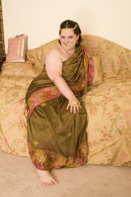 Fat solo model with saggy boobs and a big butt puts her hairy bush on display