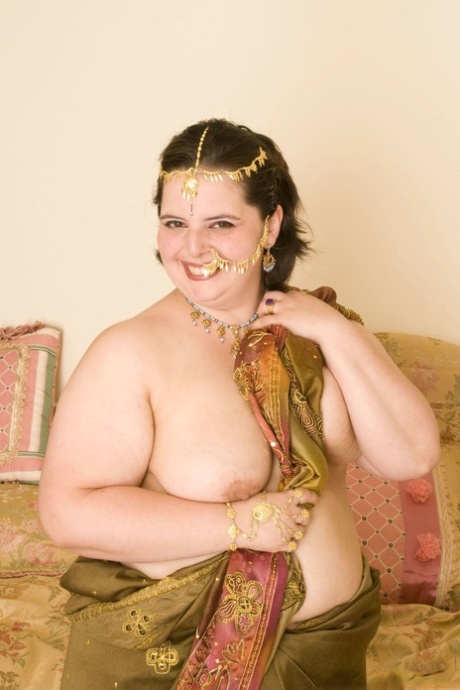 Fat solo model with saggy boobs and a big butt puts her hairy bush on display