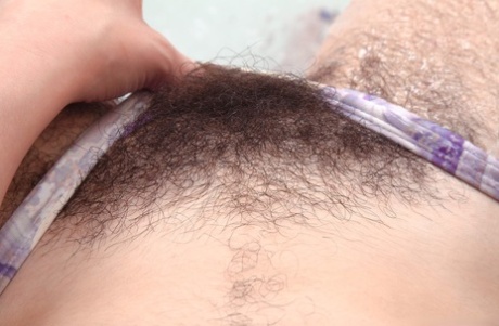 Hirsute amateur Aragne shows her her really hairy pussy and asshole in the tub