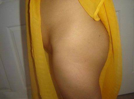 Chubby Indian female frees her shaved pussy and butt from a wrap