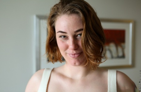 Australian housewife Molly Broad pets her pussy during nude modeling premiere