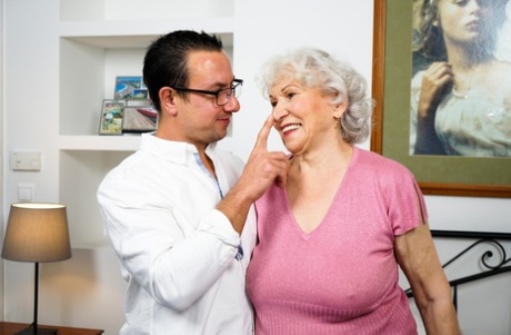 Old woman Norma B has her hairy muff licked before being banged by her toy boy