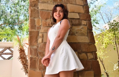 Nice girl with short hair Hazel masturbates with a dildo in a tennis outfit
