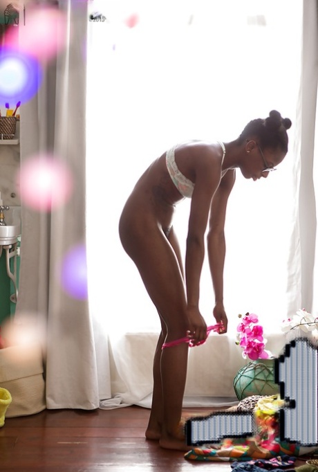Cute young amateur ebony Marysa getting dressed after masturbating