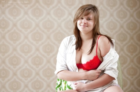Young fatty Capucine exposes her teen boobs and hairy pussy