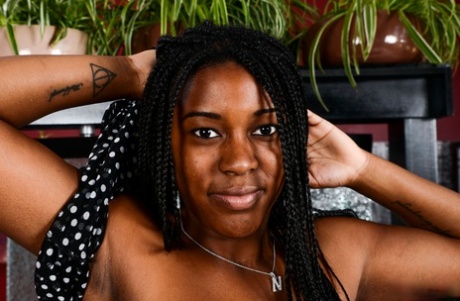 Exotic amateur stunner Janelle Taylor shows off her black body and pink snatch