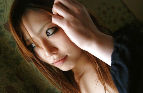Asian hottie Minami Kubo strips down and exposes her hairy twat