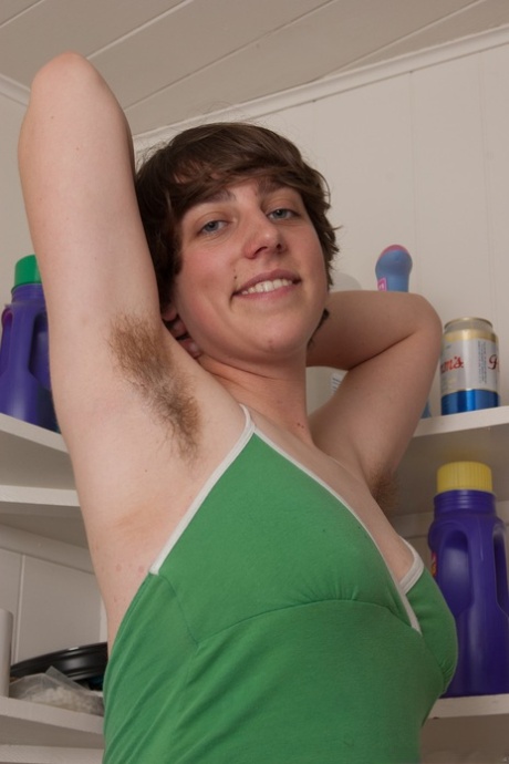 Big titted hippie Cassie teasing with her unshaved armpits and furry pussy
