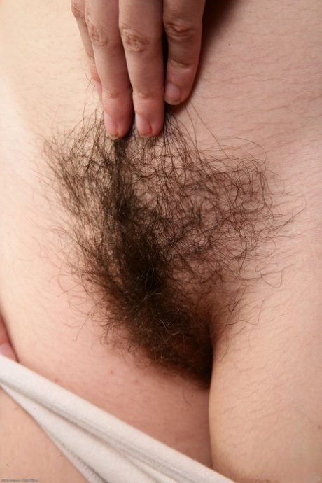 Amateur girl with hairy armpits Briar Rose flaunts her bushy twat in a solo