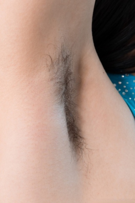 Charming brunette Bellavitana reveals her hairy body & rubs her bush