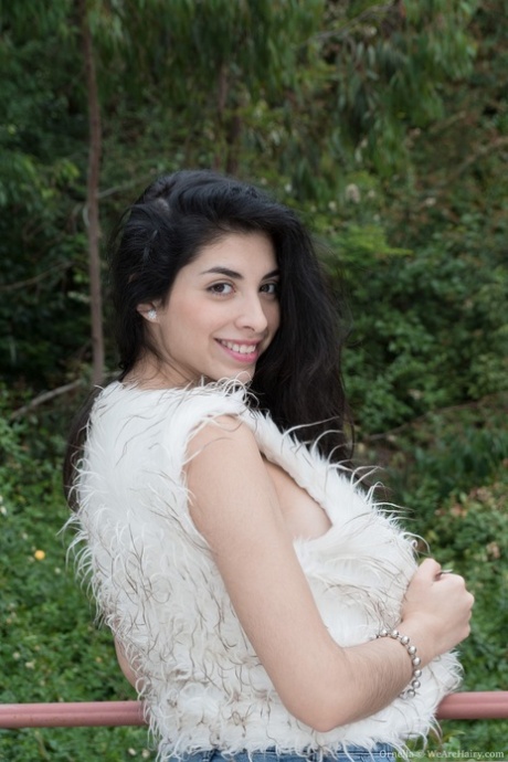 Breathtaking brunette Ornella strips & spreads her super hairy muff in public
