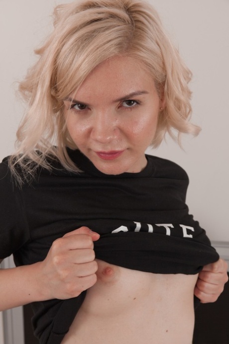 Blonde with tiny tits Baibira reveals her hairy twat and big ass