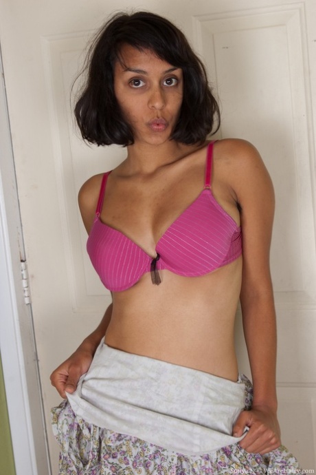 Adorable brunette with big natural tits Sonya N stimulates her hairy pussy