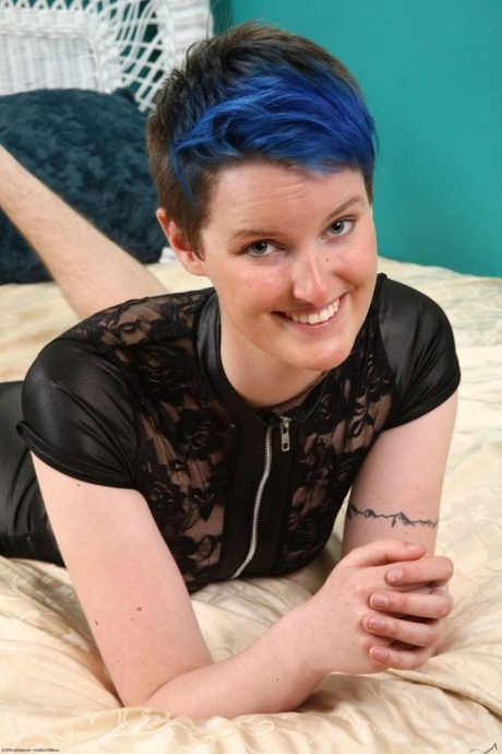 White solo girl with hairy legs and underarms exposes her beaver