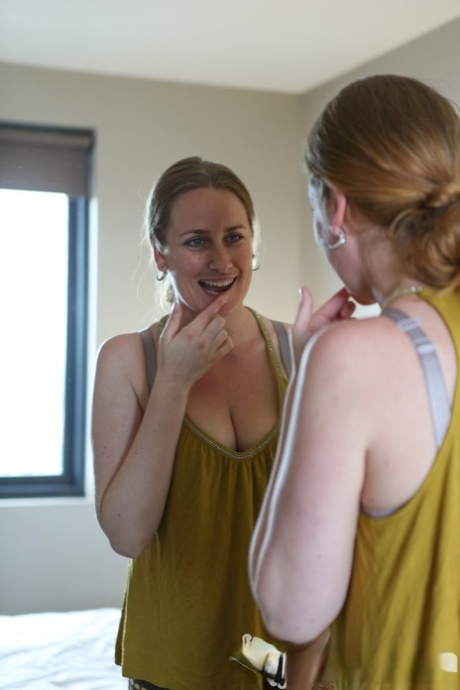 Busty Nichole shows off big breasts & plays with hairy pussy in the mirror