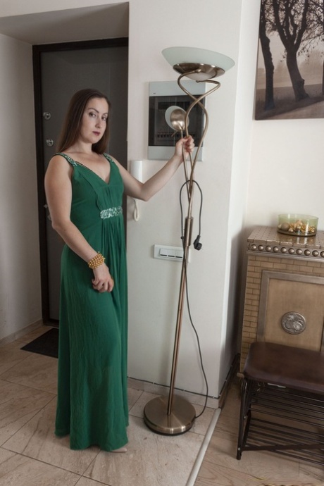 Curvaceous amateur Liana doffs her gown & nylons to show off her hairy pussy