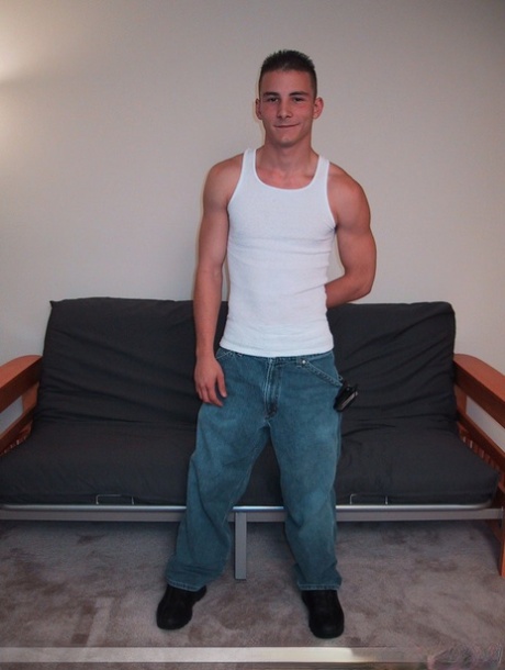 Handsome twink Sharif undresses and masturbates in a chair at the casting