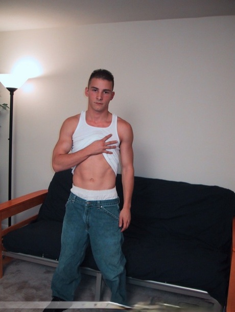 Handsome twink Sharif undresses and masturbates in a chair at the casting
