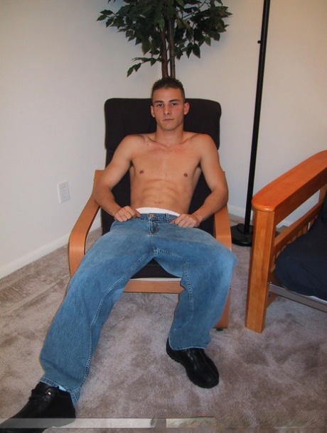 Handsome twink Sharif undresses and masturbates in a chair at the casting
