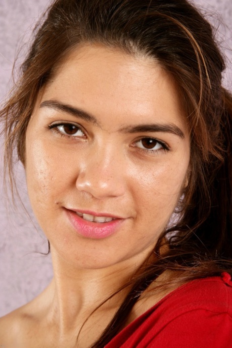 Brunette Felix Weatherwood doffs her red bodysuit and flaunts her hairy twat