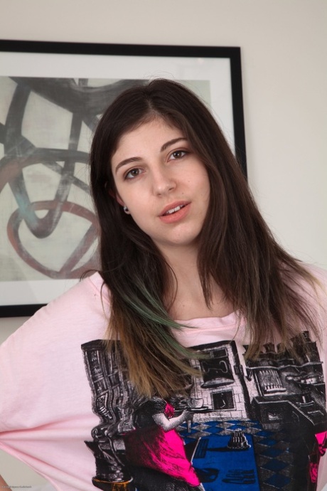 Brunette honey Elly Tripp shows her hairy crotch and big ass at home