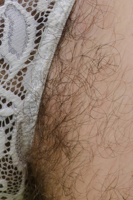 Amateur girl in a lacy bodysuit Kisa Fae unveils her hairy twat and body