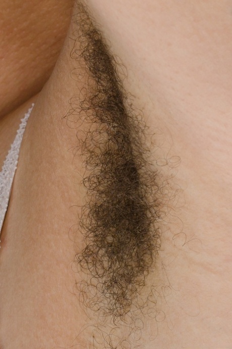 Curly-haired beauty Kendi Oh strips & shows her hairy inked body outdoors