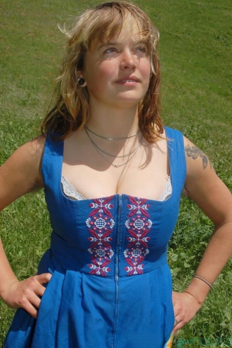 Cute amateur girl Celia unveils her big boobs and hairy pussy outdoors