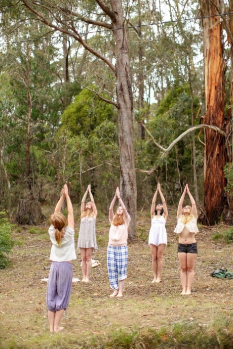 Gorgeous Australian girls practicing yoga in their hot outfits in nature