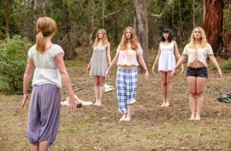 Gorgeous Australian girls practicing yoga in their hot outfits in nature