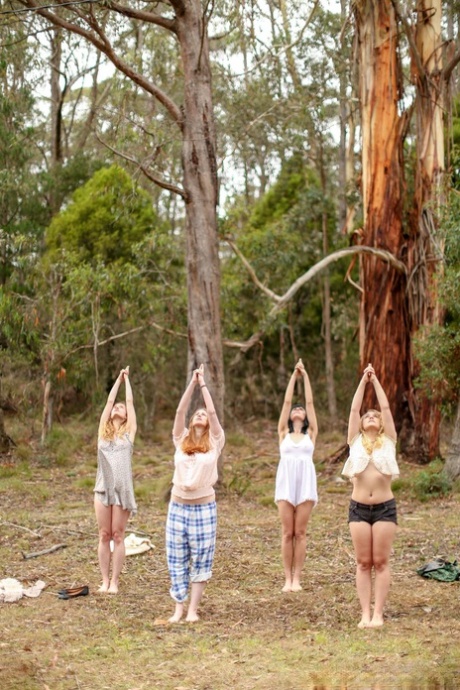 Gorgeous Australian girls practicing yoga in their hot outfits in nature