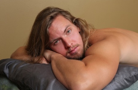 Long-haired gay boy Cullen receives a BJ from horny masseur Bryan