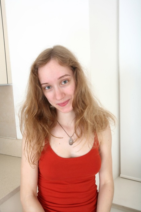 Sexy amateur Zazie strips naked and spreads her hairy pussy up close