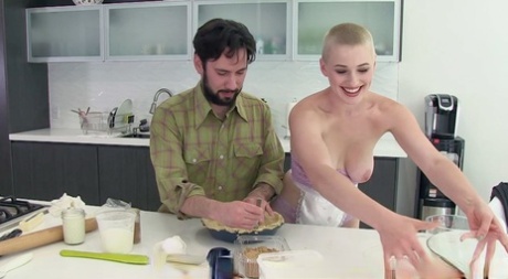 Shaved-headed Riley Nixon enjoys a messy fuck with Tommy Piston in the kitchen
