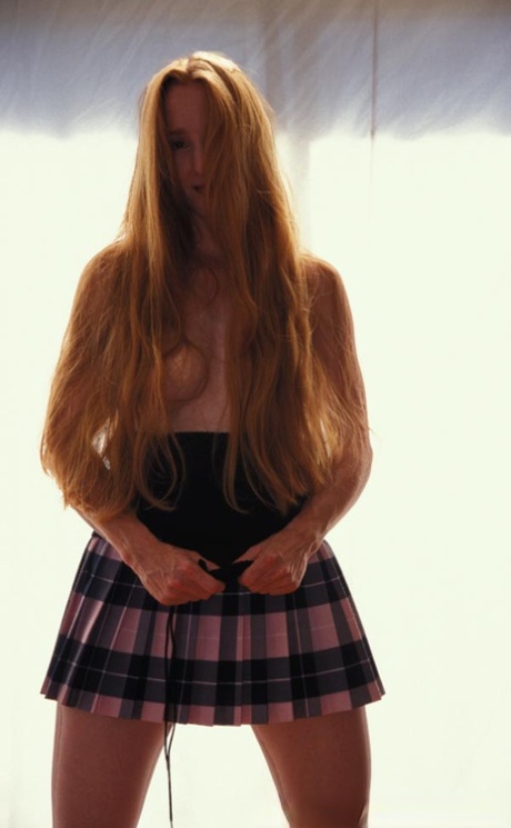 Redheaded vixen Anna May enjoys a hot POV fuck & receives a facial