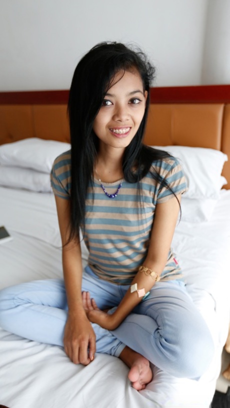 Attractive Asian babe unveils her natural boobs and enjoys POV sex