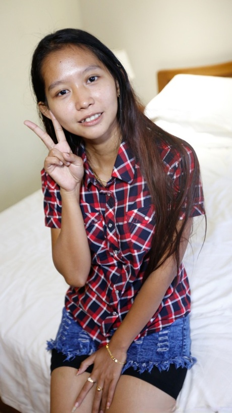 Cute Asian babe Toto shows off her petite body while stripping for POV sex