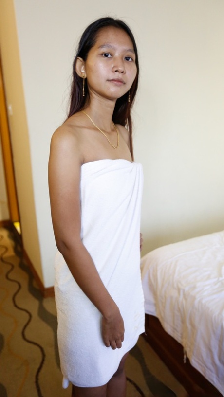 Cute Asian babe Toto shows off her petite body while stripping for POV sex