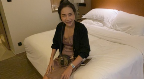 Pretty Asian girl Fern B enjoys some POV hardcore sex in her hotel room
