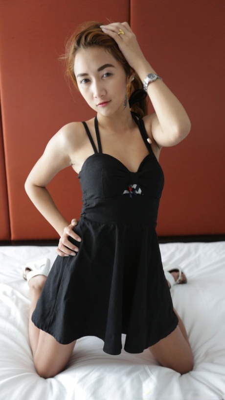 Dirty Asian girl An C shows her ass and takes a fat boner in her bushy cunt