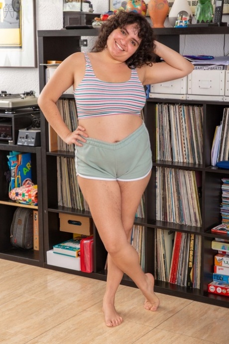 Chubby amateur Emily V exposes her big tits & hairy legs & twat before toying