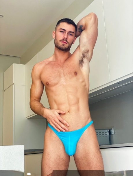 Gay amateur Bastian Karim exposes his muscles and gets his holes fucked