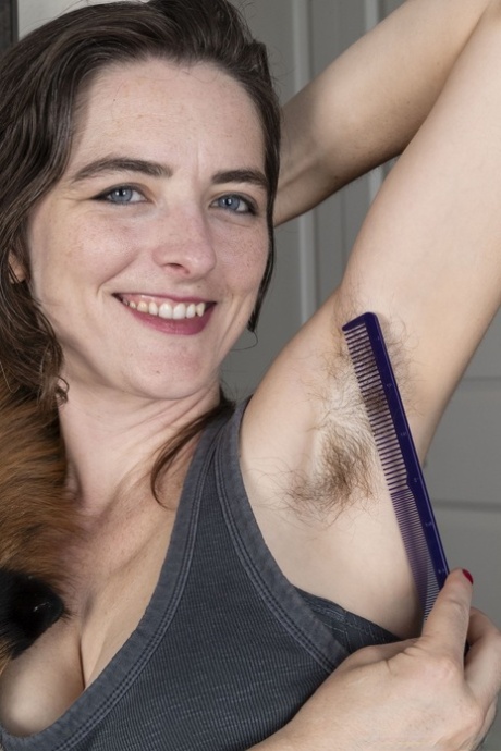 Brunette amateur Snow brushes her unshaven armpits & fingers her hairy twat