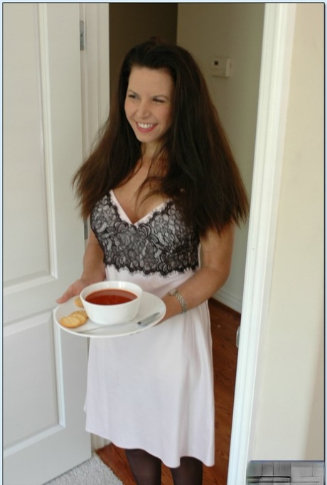 Busty mature slut Selena Steele feeds a sick boy and fucks him well